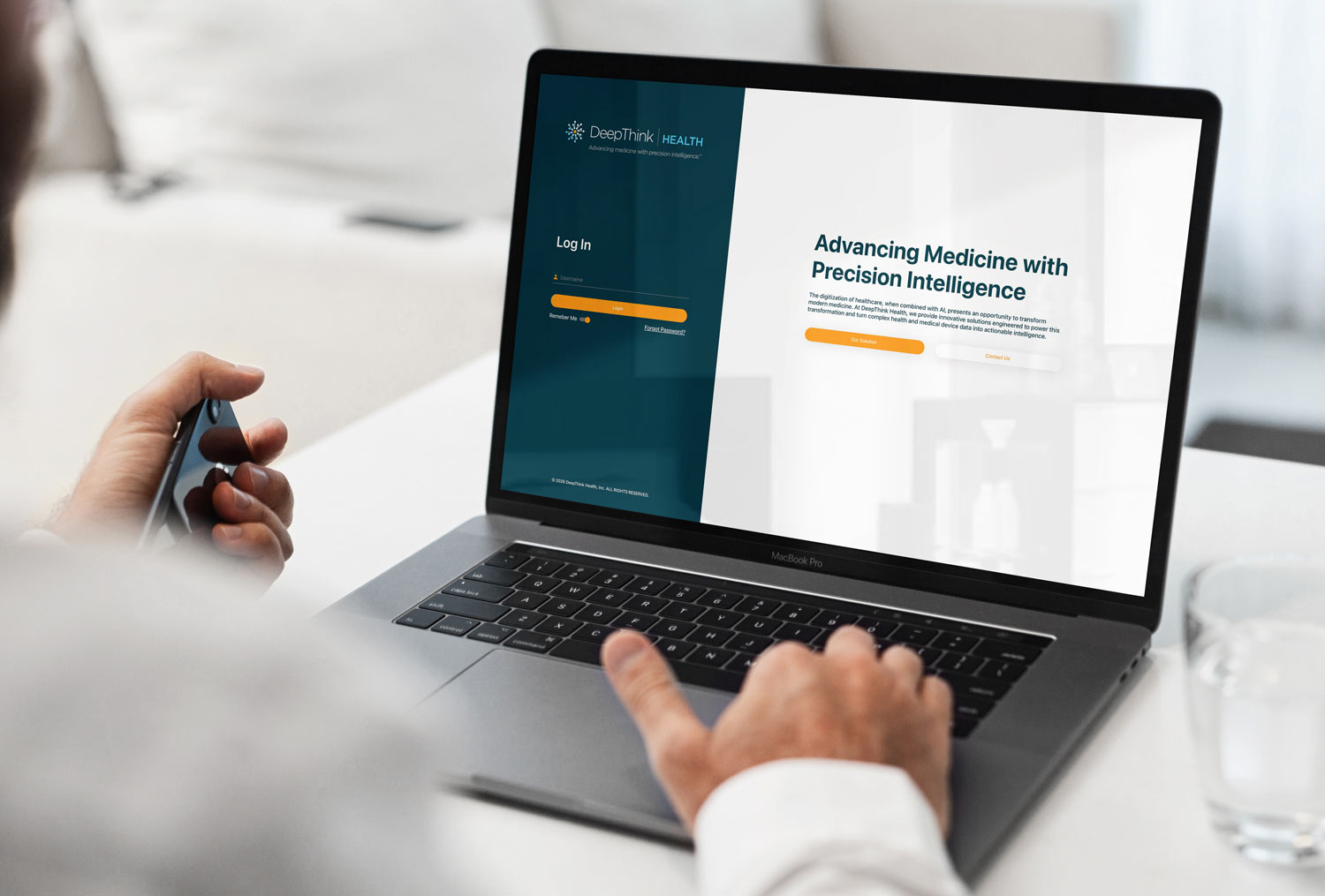 Physician logging into the DeepThink software on a laptop